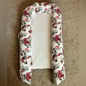 Dock a tot grand. Like new. Only used a few times. La vie en rose print.